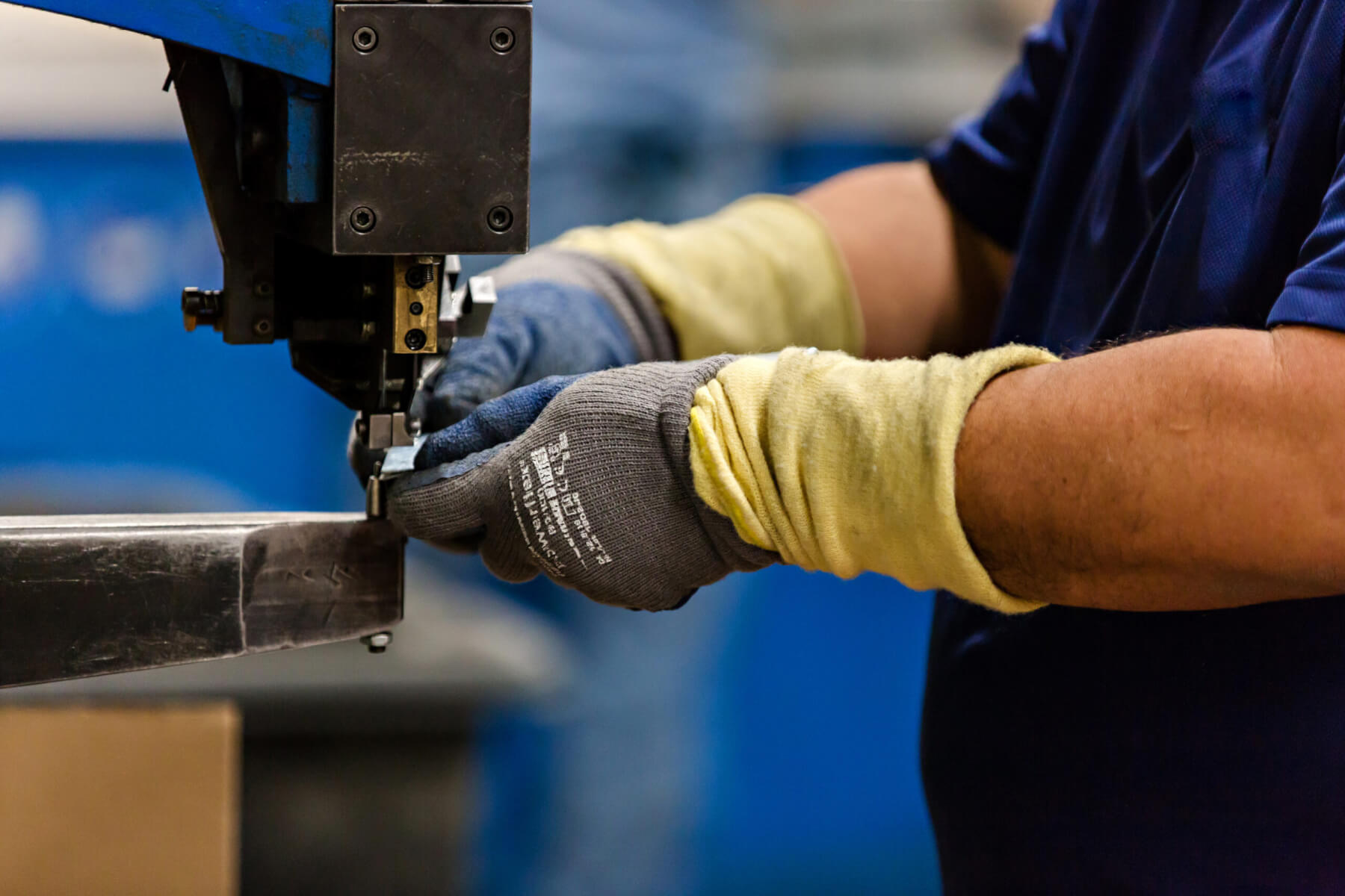 Tradesman Employee Forming New HVAC Parts